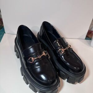 Black Loafers with Gold Accent